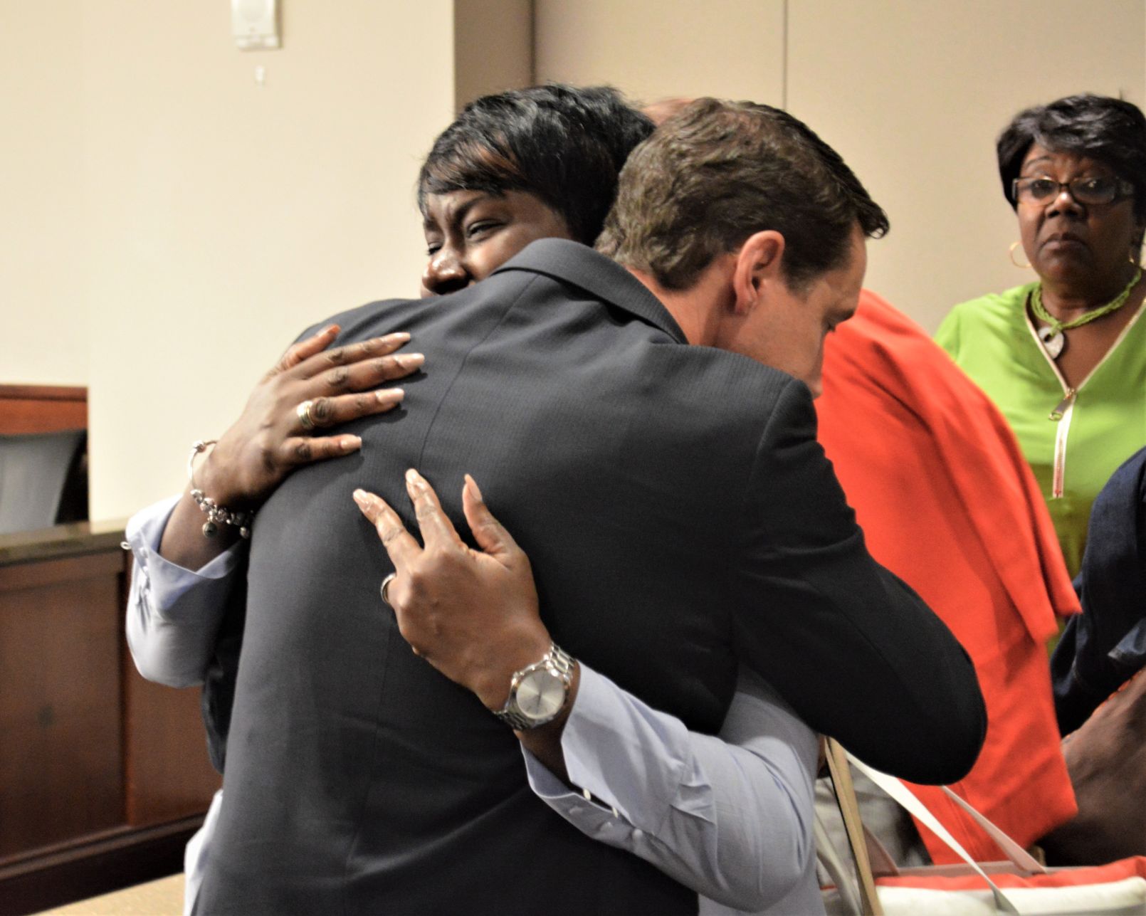 Cynthia Welch embraces Jessie Evans